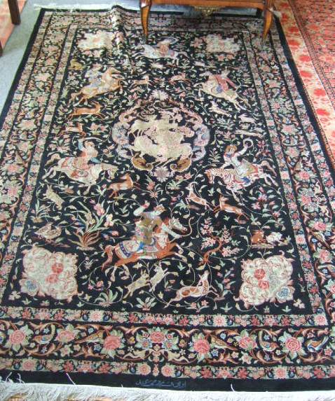 Appraisal: A fine silk Ghom hunting rug Persian the black field