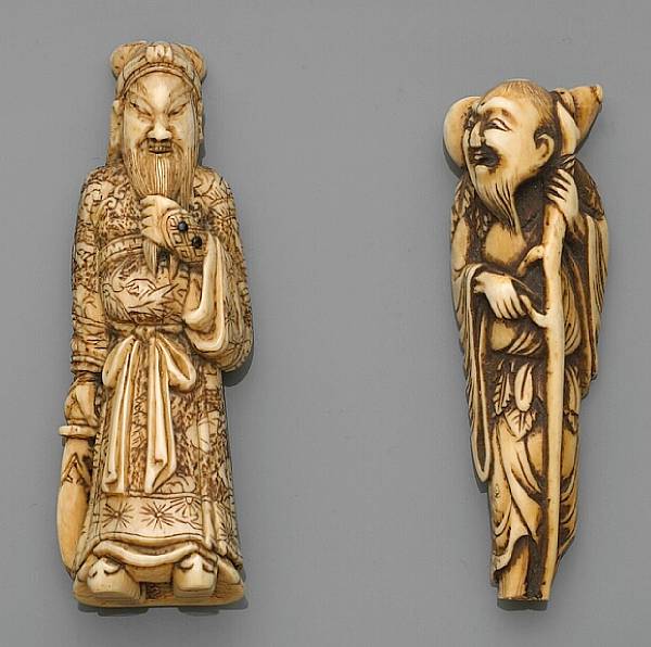 Appraisal: Two large ivory figural netsuke The first Edo Period carved