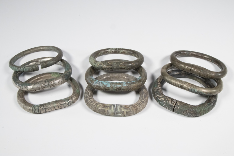 Appraisal: ANCIENT CHINESE SILVER BRACELETS Group of Early Silver Split Bangle