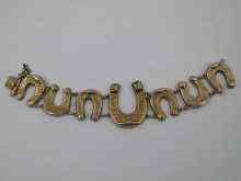 Appraisal: A Russian hallmarked silver gilt bracelet comprising horseshoe motif links