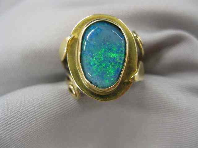 Appraisal: Black Opal Ring fiery gem in k yellow gold