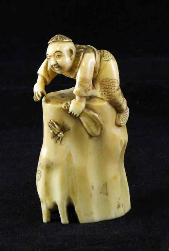 Appraisal: A Japanese walrus ivory carving early th century depicting a