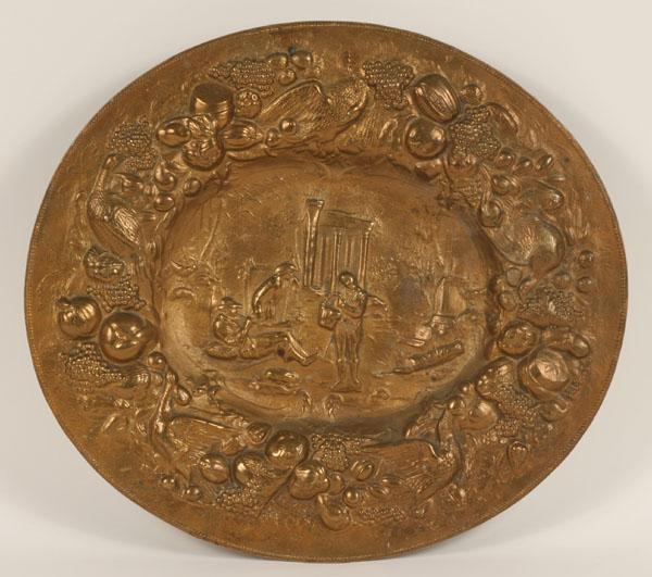 Appraisal: Oval repousse wall plaque solid brass with raised decoration game