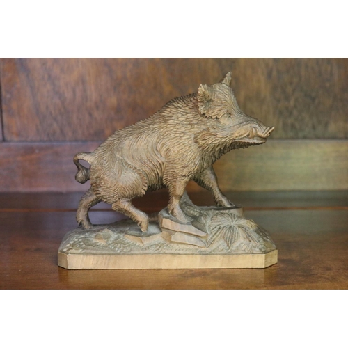 Appraisal: Swiss Black Forest limewood carved study of a boar circa