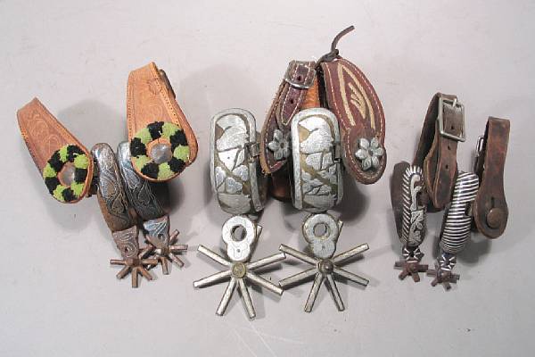 Appraisal: A lot of three pairs of Mexican spurs Including a