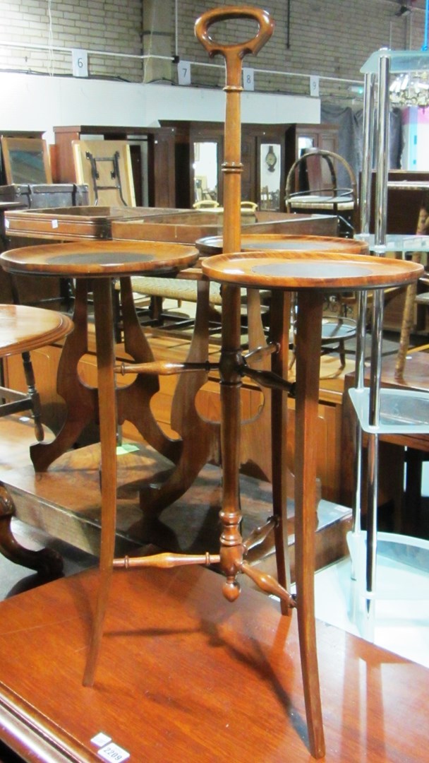 Appraisal: A late Victorian mahogany three-section cake stand