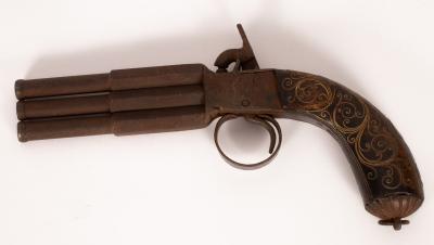 Appraisal: A triple barrel percussion cap pistol with brass stringing to