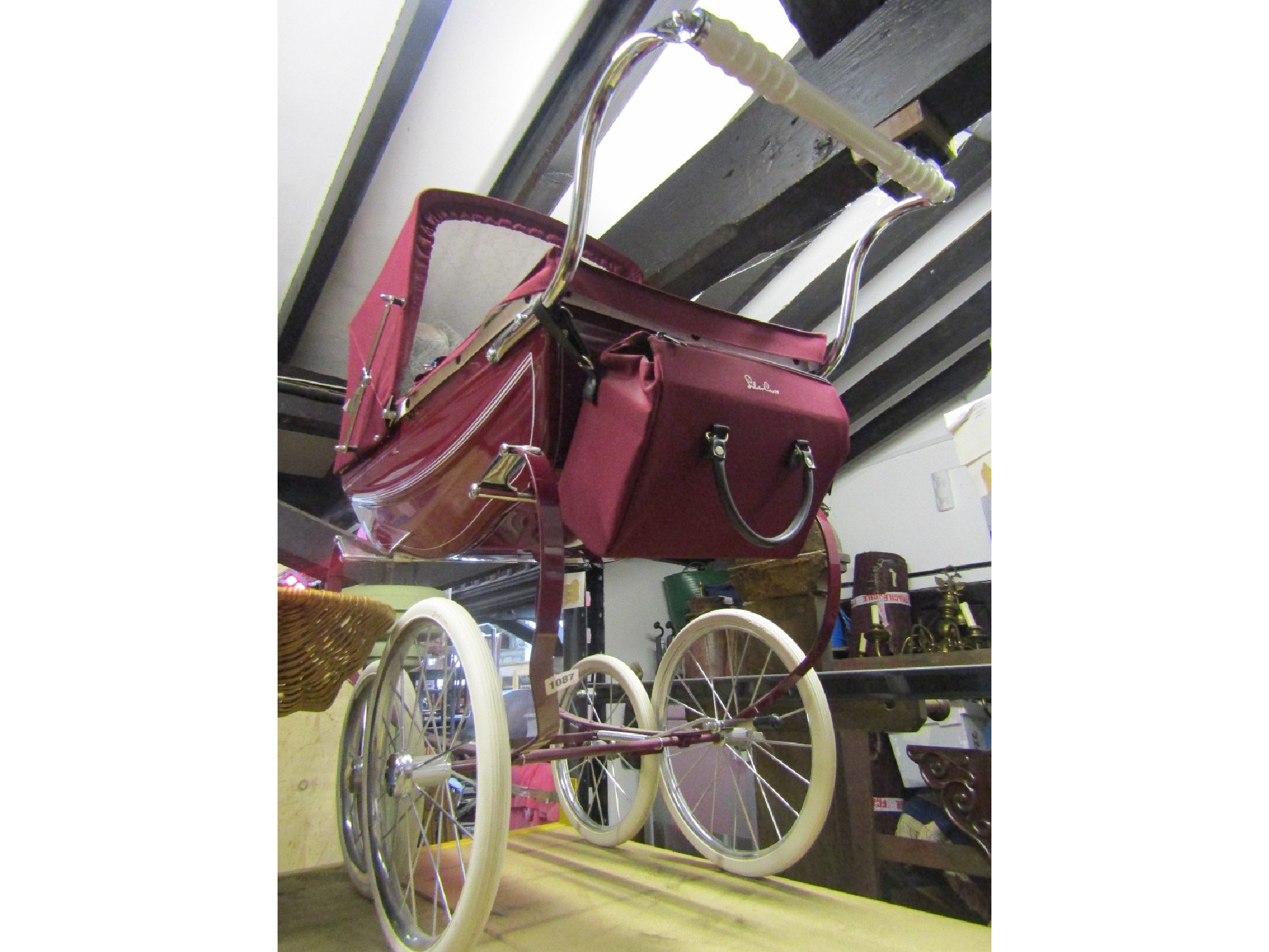 Appraisal: A Silver Cross child's coach built toy pram with sprung