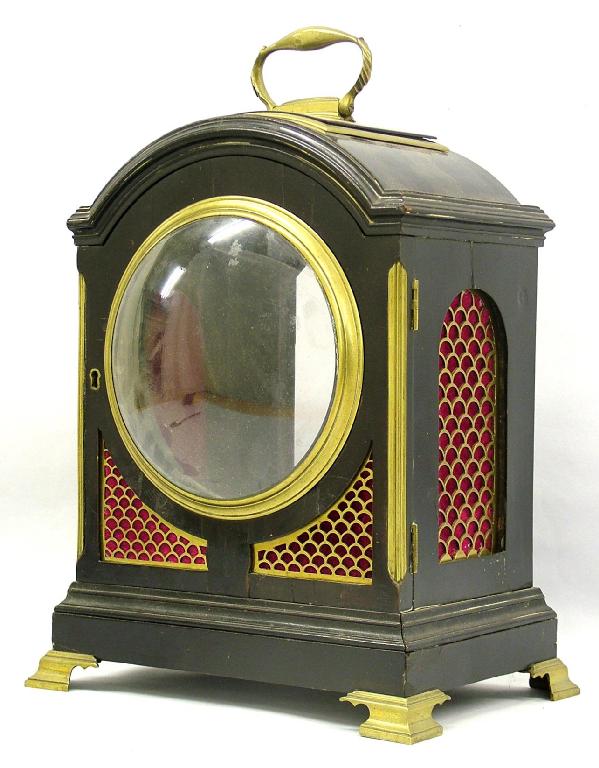 Appraisal: Ebonised and brass mounted bracket clock case with aperture for