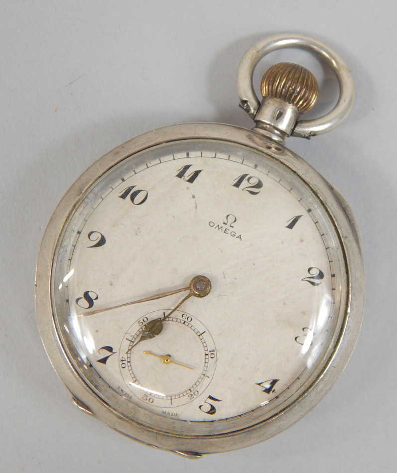 Appraisal: An Omega white metal cased pocket watch with silvered dial