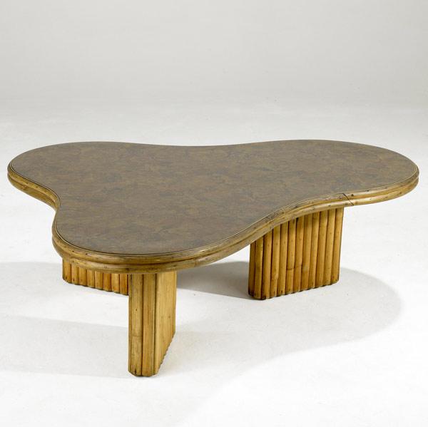 Appraisal: STYLE OF PAUL FRANKL Coffee table in laminate and split