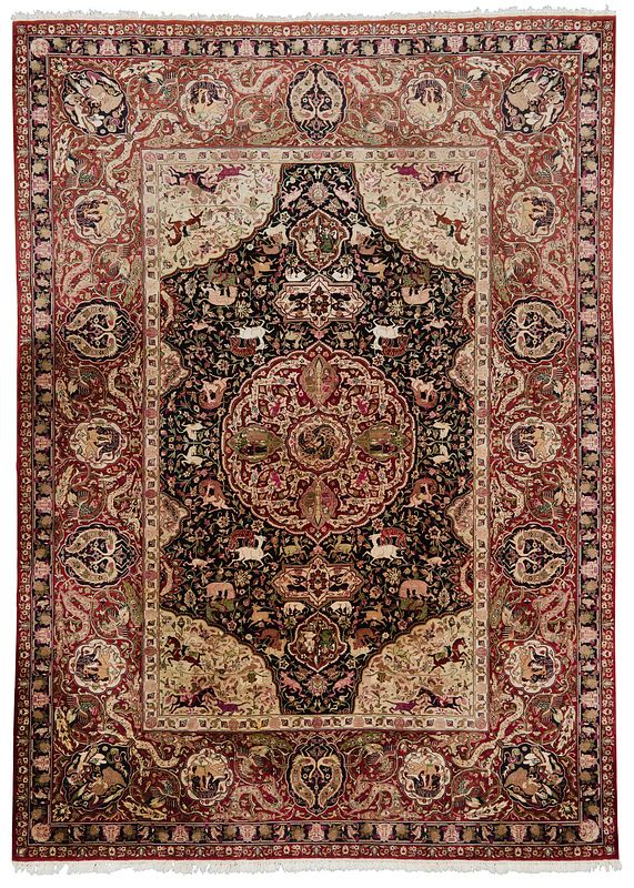 Appraisal: Kerman Carpet Hunting Scene th century dark field with round