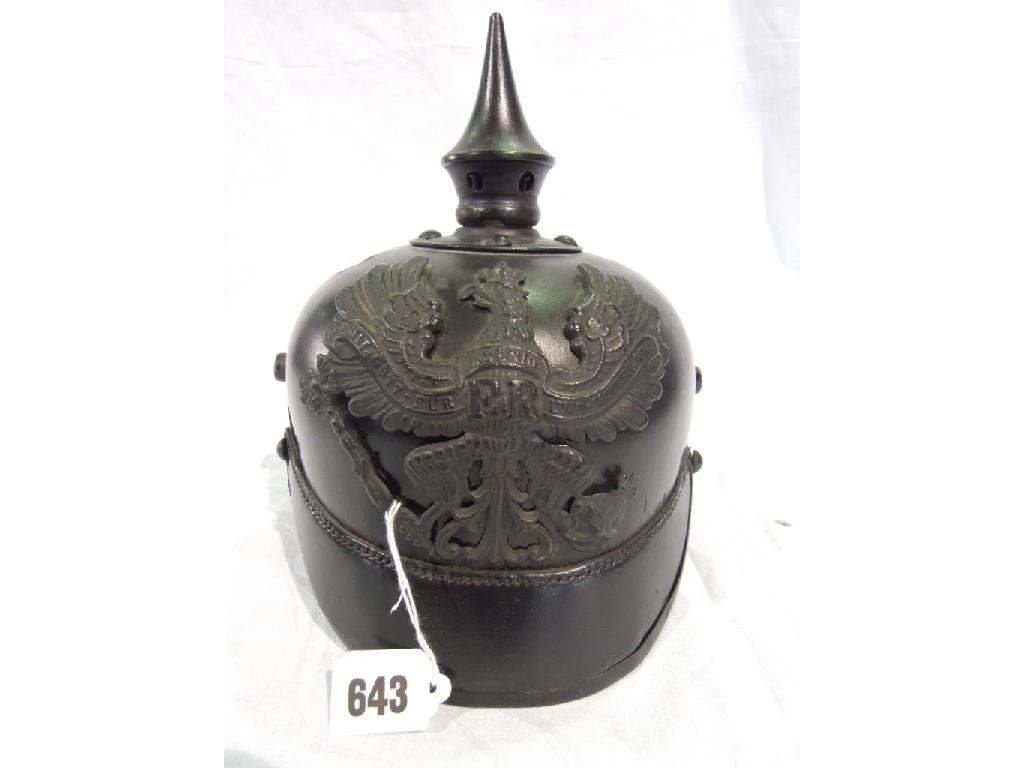 Appraisal: A Prussian First World War Pickelhaube helmet with indistinct makers