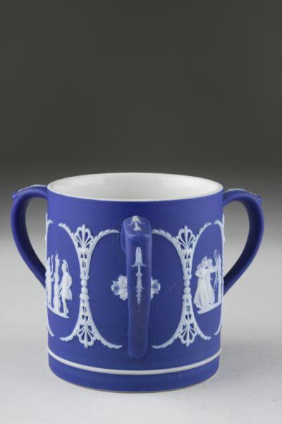 Appraisal: Wedgwood Dark Blue Jasperware Loving Cup with three applied handles