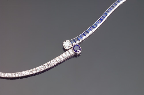 Appraisal: ART DECO Elegant bypass-style diamond and sapphire bracelet in platinum