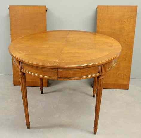 Appraisal: Italian fruitwood breakfast table with brass mounts reeded legs and