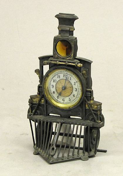 Appraisal: An American metal novelty train desk clock In the form