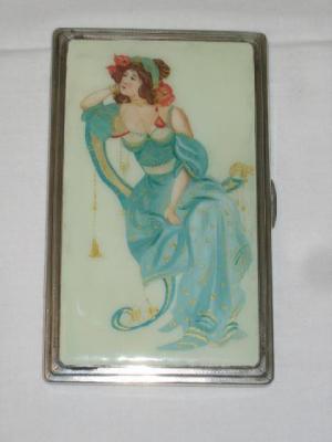 Appraisal: AN ENAMELLED CIGARETTE CASE of rounded oblong form depicting a