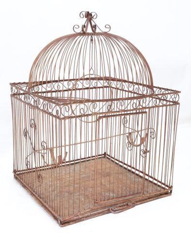 Appraisal: Large wrought iron bird cage having domed top with scrolled