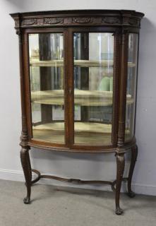 Appraisal: Impressive Oak Finely Carved Curved Gla Vitrine Great quality with