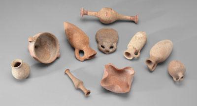 Appraisal: Ten ancient terracotta vessels most antipodal lacking feet one marked