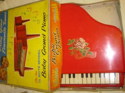 Appraisal: A toy baby grand piano painted wood construction with fifteen