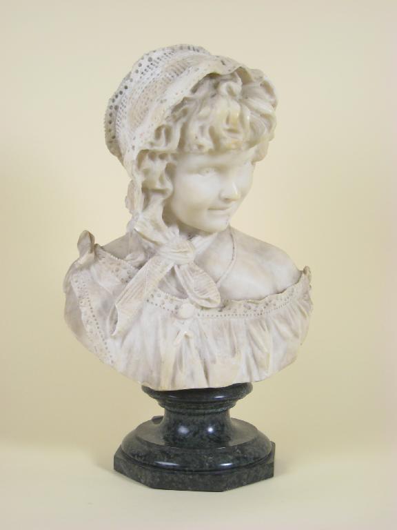 Appraisal: An alabaster portrait bust of a girl wearing head-dress with