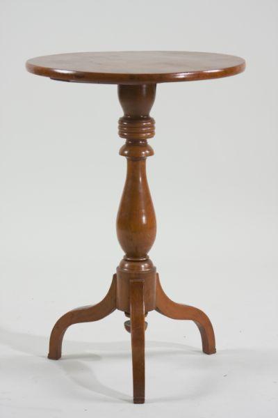 Appraisal: American Cherry Candlestand th c circular one board top over