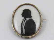 Appraisal: A black enamel on porcelain silhouette of a gentleman in