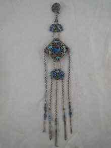 Appraisal: A Chinese white metal tests silver and enamel chatelaine approx