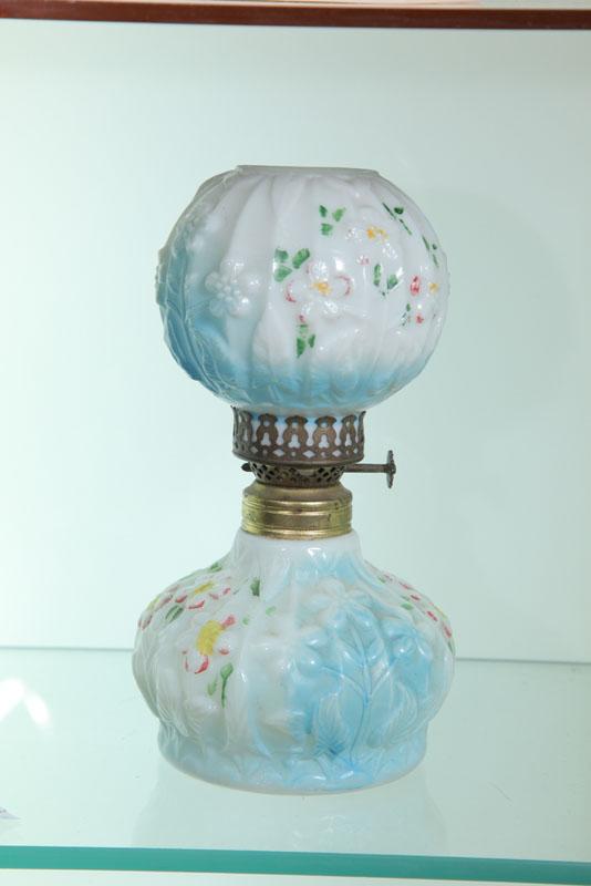 Appraisal: MINIATURE LAMP Milk glass lamp with embossed flwoers and blue