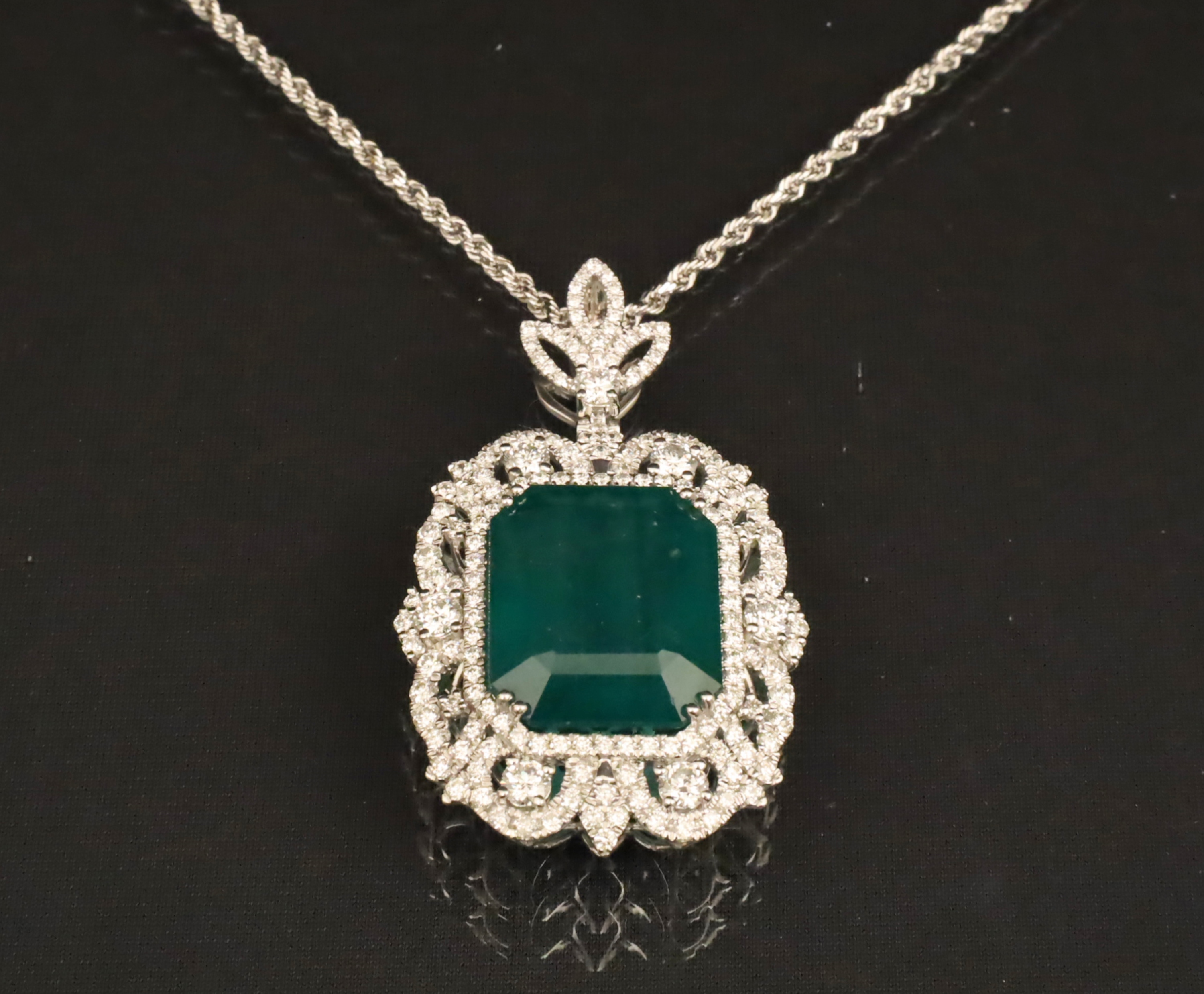 Appraisal: PLATINUM EMERALD DIAMOND PENDANT NECKLACE Platinum Emerald and Diamond pendant