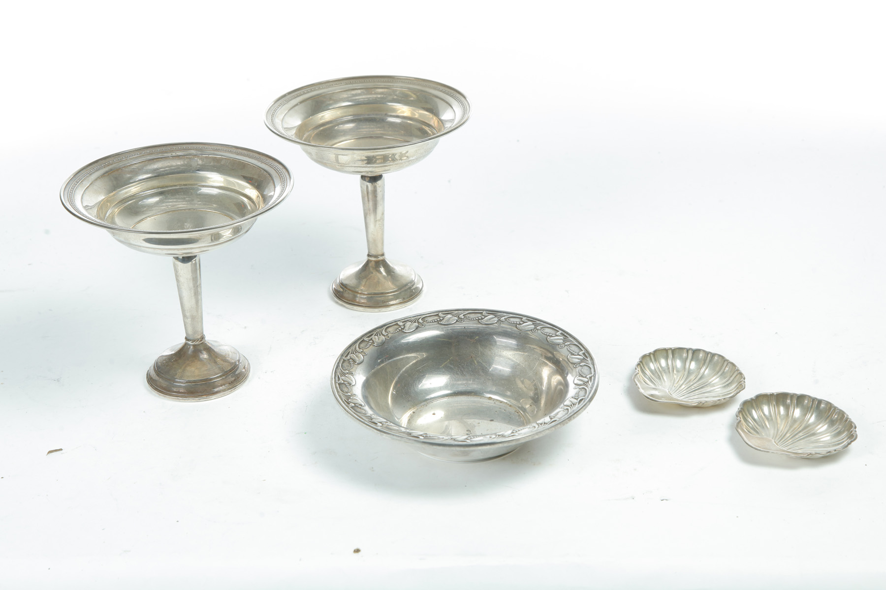 Appraisal: FIVE PIECES OF AMERICAN STERLING Twentieth century Pair of shell