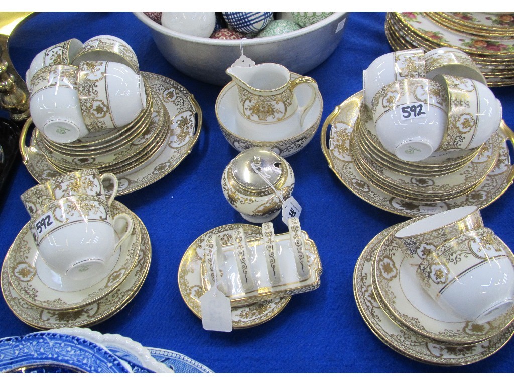 Appraisal: Noritake teaset the white ground with cream and gilt decoration