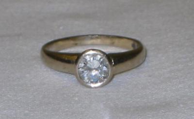 Appraisal: A SOLITAIRE DIAMOND RING the brilliant cut stone approximately cts