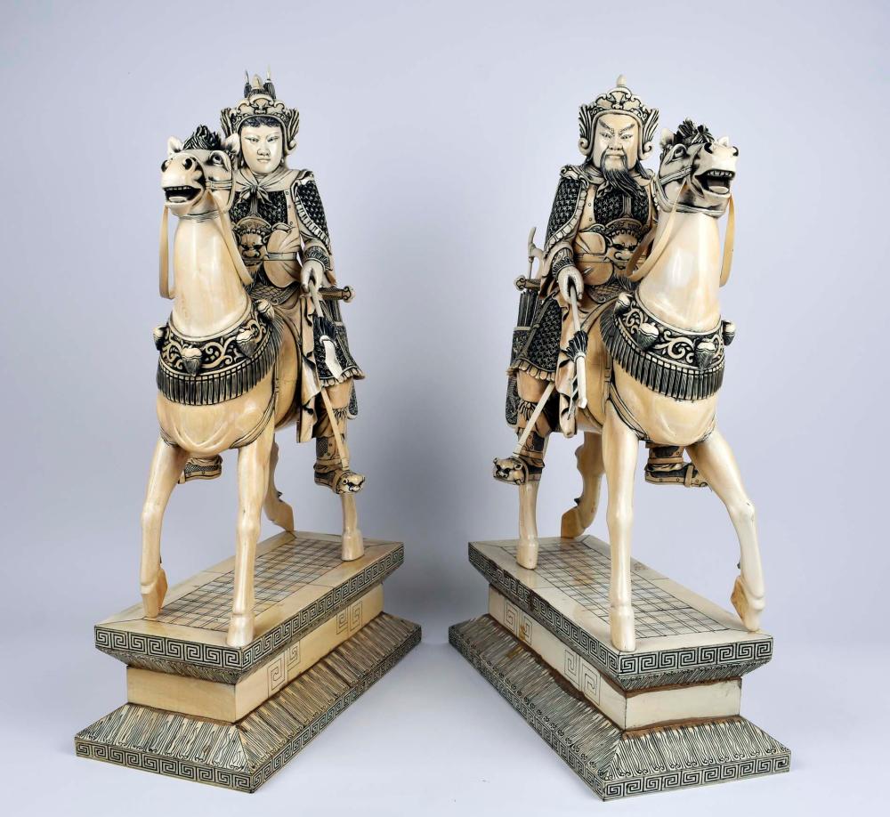 Appraisal: PAIR OF LARGE CHINESE WARRIORS ON HORSEBACKThe running horses with