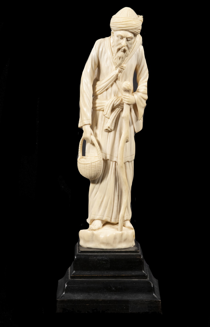 Appraisal: JAPANESE TH C IVORY FIGURE OF A GAIJIN TRAVELER Western