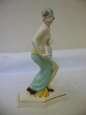 Appraisal: A ROYAL DUX PORCELAIN FIGURE depicting a female dancer in