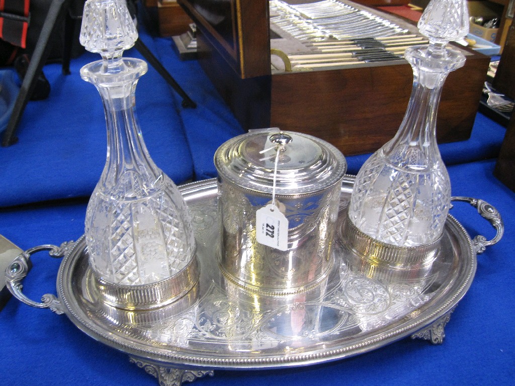 Appraisal: Silver plated decanter biscuit box stand