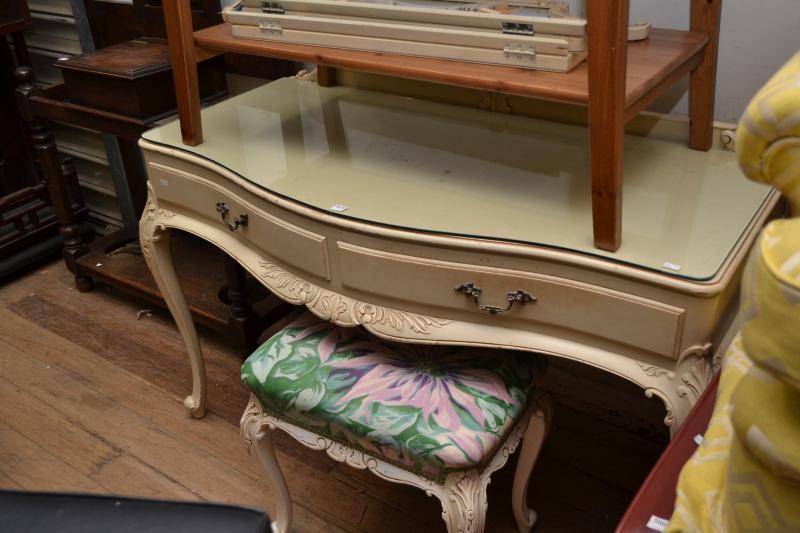 Appraisal: AN ITALIANATE CREAM PAINTED SERPENTINE DRESSING TABLE WITH STOOL AND