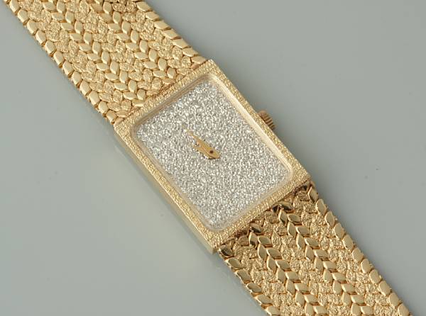 Appraisal: A k gold bracelet wristwatch with diamond dial Length in