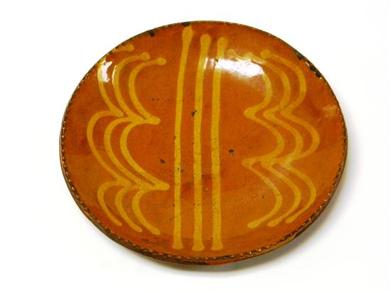 Appraisal: Redware dish with raised sides yellow and red glaze with