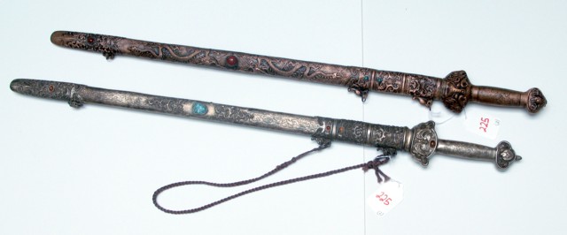 Appraisal: TWO CHINESE STYLE DRESS SWORDS copper reposse' with inset jewels