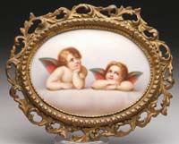 Appraisal: FRAMED OVAL PORCELAIN HAND PAINTED PLAQUE Scene shows two cherubs