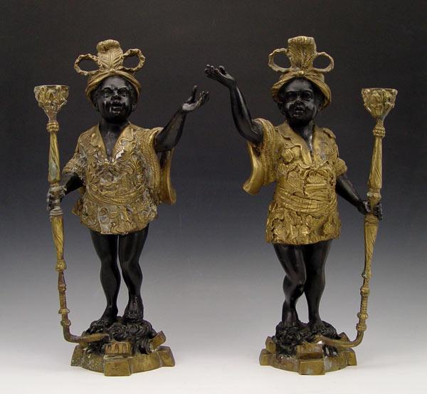 Appraisal: PAIR CONTEMPORARY BRONZE FIGURAL BLACKAMOOR CANDLE HOLDERS Each holds single