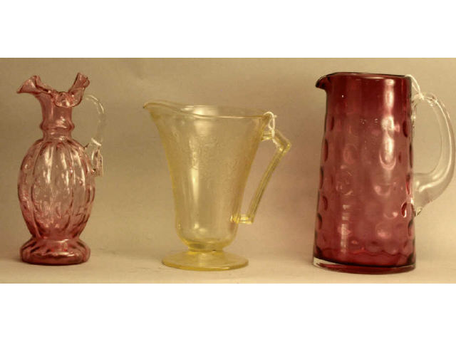 Appraisal: Collection of glass pitchers including Florentine depression glass pitcher ruffled