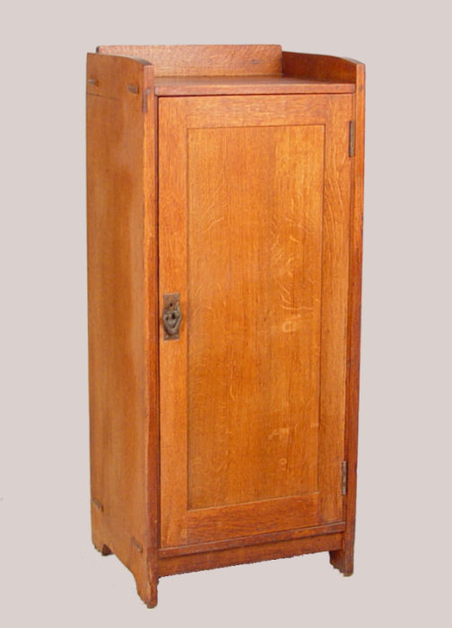 Appraisal: GUSTAV STICKLEY MUSIC CABINET NO Five adjustable shelves behind paneled