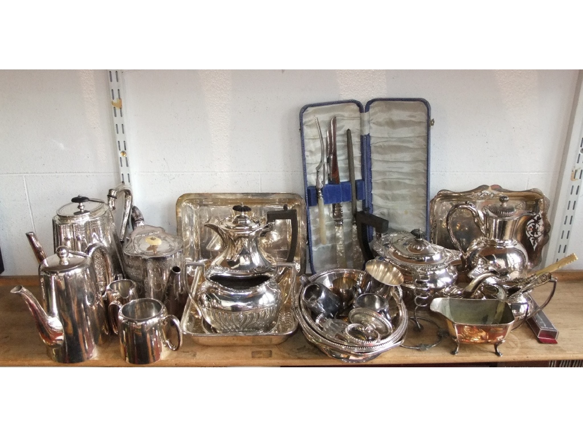 Appraisal: A collection of silver plated wares to include a simple