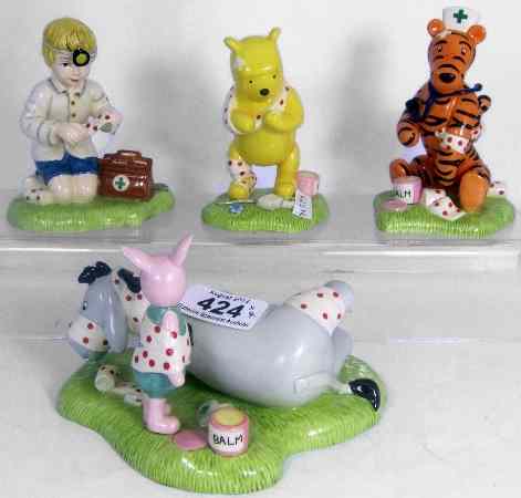 Appraisal: Royal Doulton Winnie the Pooh Figures from the First Aid