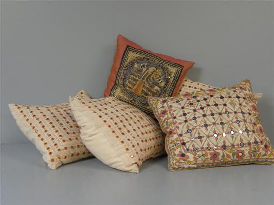 Appraisal: Five hand embroidered cushions four with embroidery framing tiny mirrors